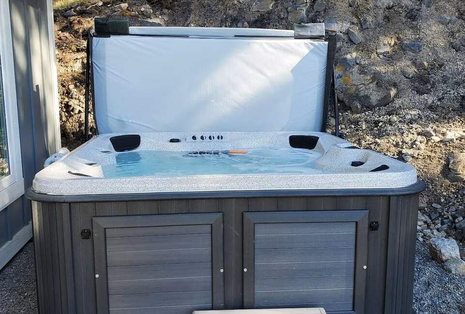 Backyard hot tube. Its a 7 seat, but fits 4-5 comfortably.