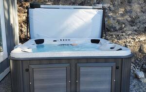 Backyard hot tube. Its a 7 seat, but fits 4-5 comfortably.