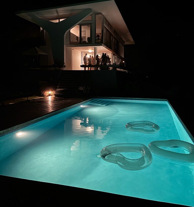 pool at night with lights on