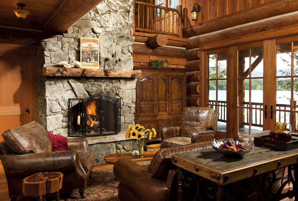 living room with fireplace and view to the lake