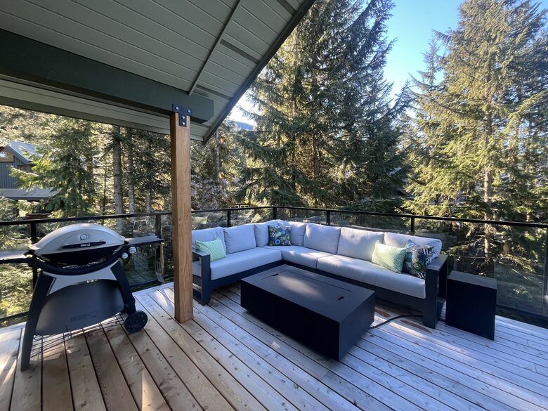 Upper deck - SW facing. Large sectional with, propane BBQ and firepit.