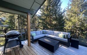 Upper deck - SW facing. Large sectional with, propane BBQ and firepit.