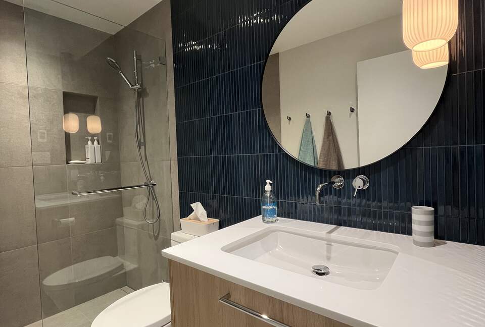 1st floor bathroom with large shower.