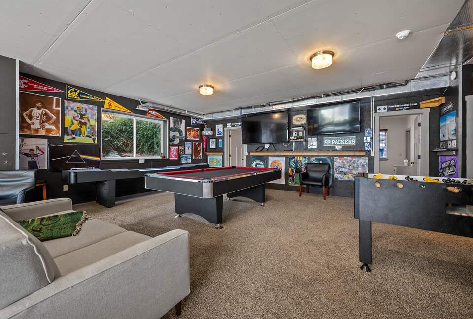 Game room with billiards, foosball, shuffleboard, and ping-pong