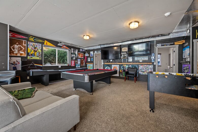 Game room with billiards, foosball, shuffleboard, and ping-pong