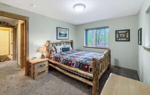 Main floor Queen Bed 1