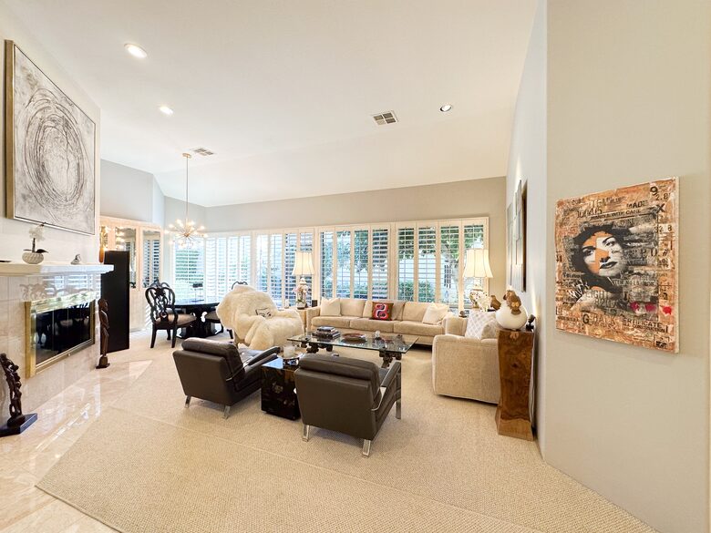 Elegant Formal Living Room with a Fireplace