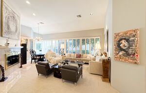 Elegant Formal Living Room with a Fireplace