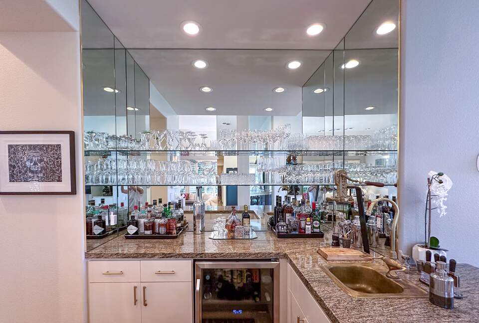 Chic Wet Bar with Granite Countertops