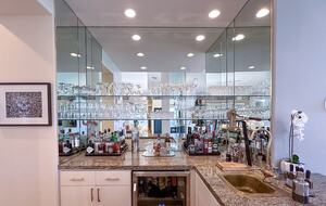 Chic Wet Bar with Granite Countertops