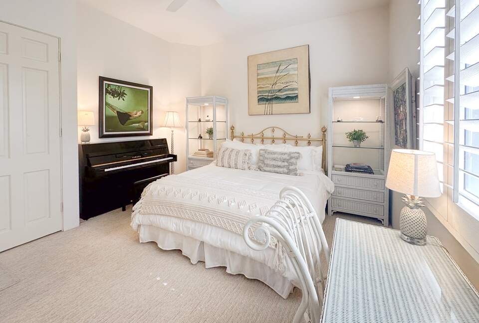 Guest Suite with Yamaha Upright Piano and Art Accents