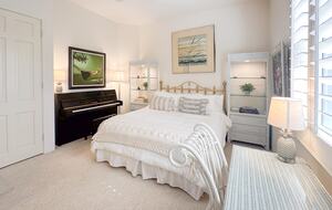 Guest Suite with Yamaha Upright Piano and Art Accents