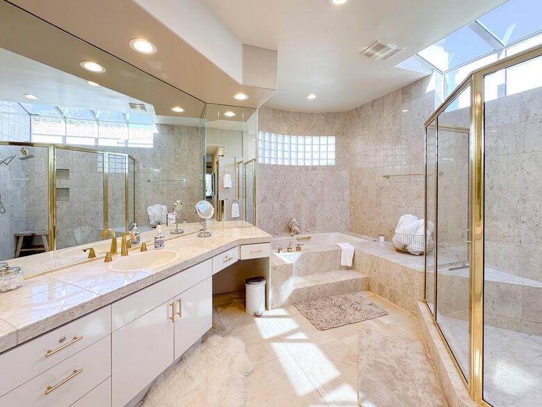 Luxurious Master Bath with Dual Vanities, Shower, & Jacuzzi