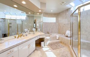 Luxurious Master Bath with Dual Vanities, Shower, & Jacuzzi