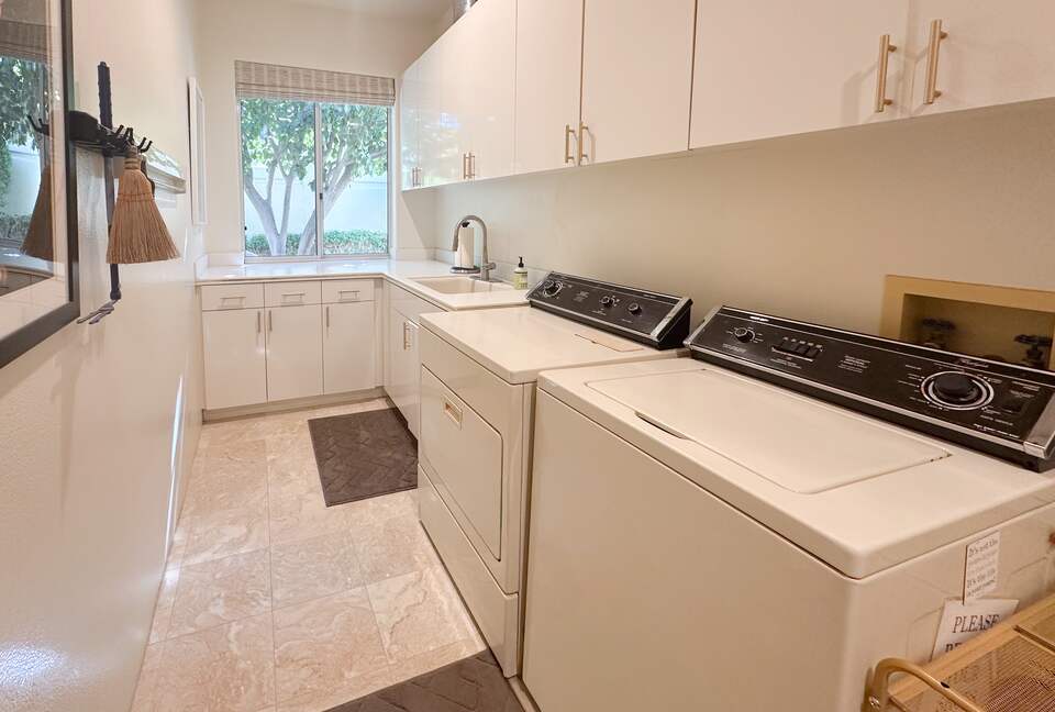 Laundry Room Adjacent to Garage