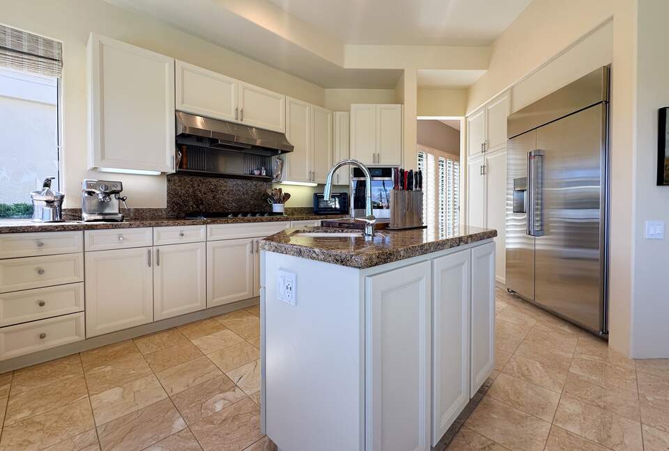 Sunlit Kitchen with Sleek Stainless Appliances