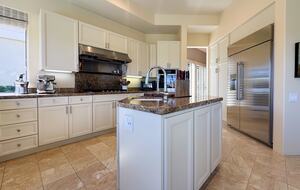 Sunlit Kitchen with Sleek Stainless Appliances