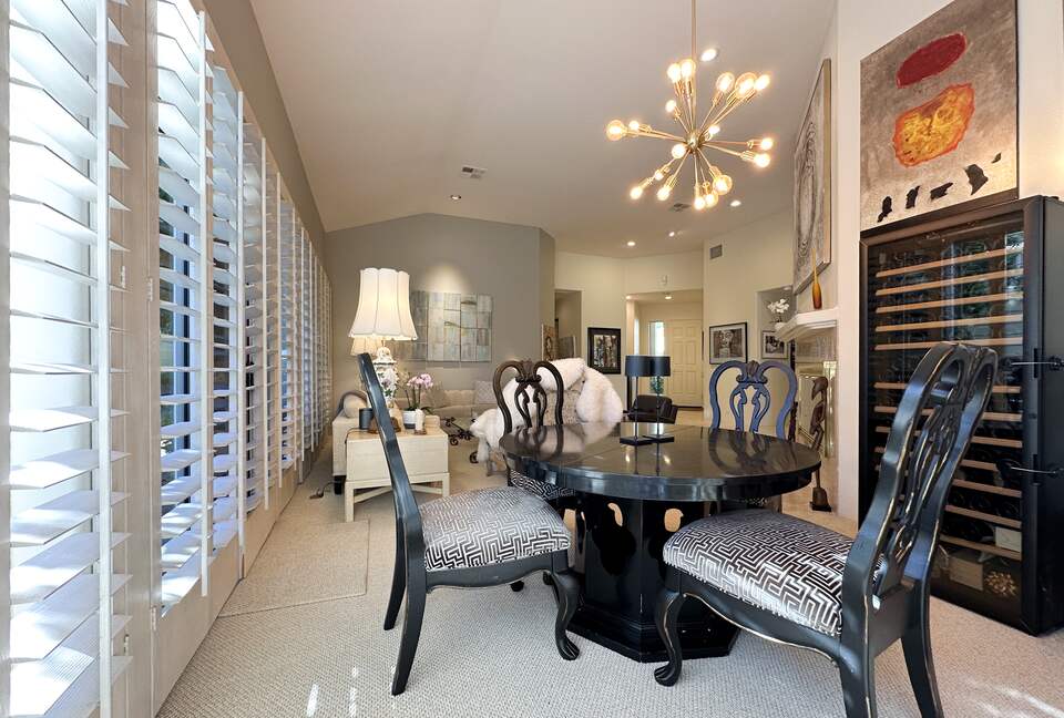 Refined Dining Room with Designer Lighting