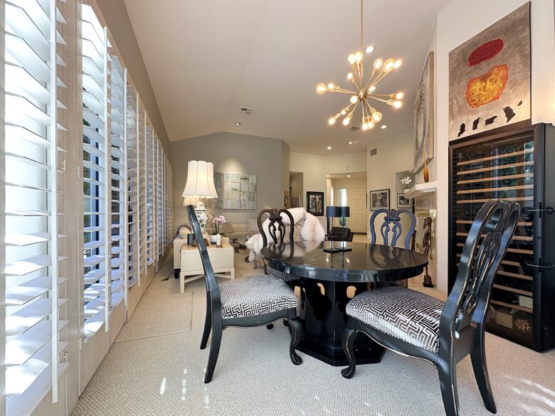 Refined Dining Room with Designer Lighting