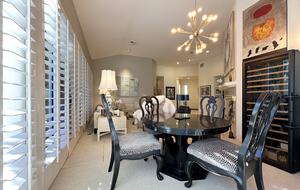 Refined Dining Room with Designer Lighting