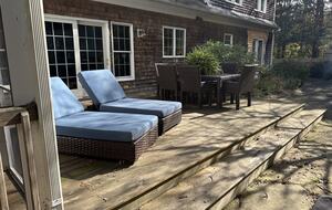 Back Deck with Lounges and Outdoor Table