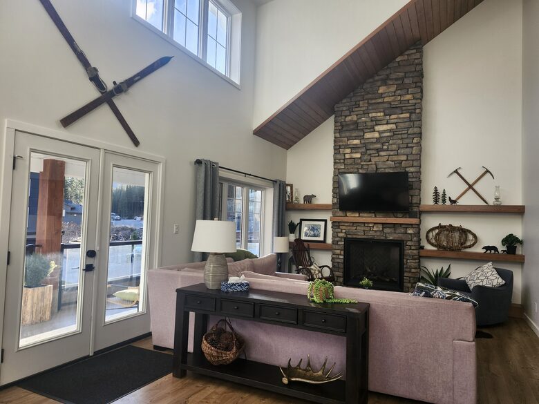 Main level living room. Doors to large balcony.