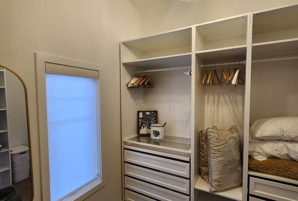 Upstairs master bedroom walkin closet.