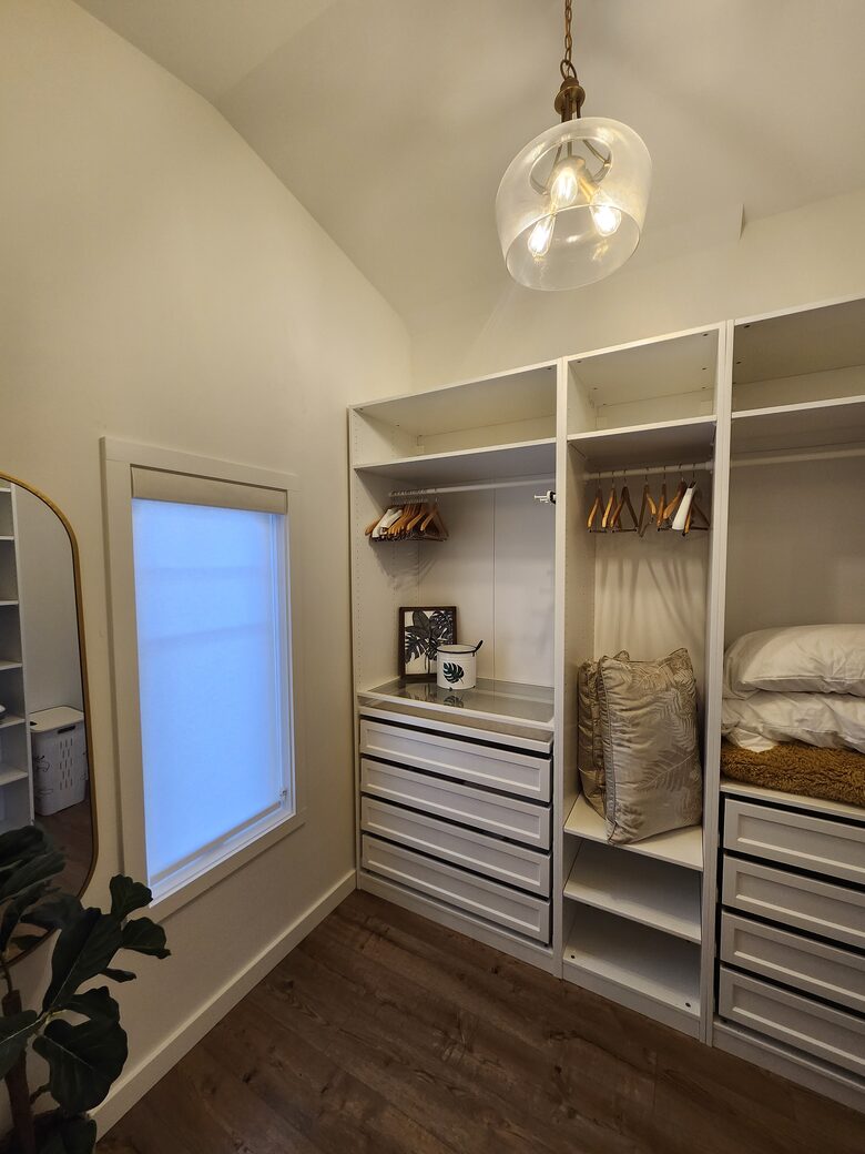 Upstairs master bedroom walkin closet.
