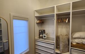 Upstairs master bedroom walkin closet.