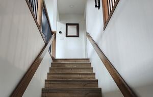 Stairs from the main entrance to the main floor.