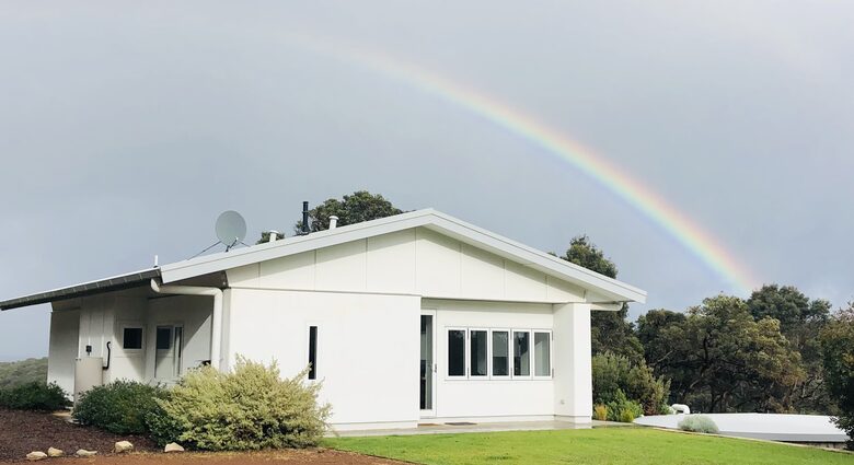 Front of the house with ample parking for two cars