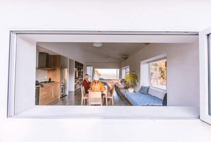 Living area with double day beds ocean, river and tree views