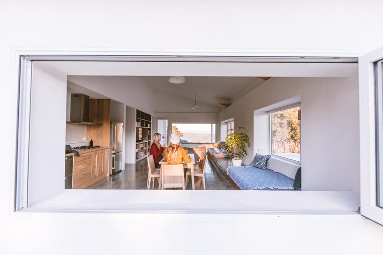 Living area with double day beds ocean, river and tree views