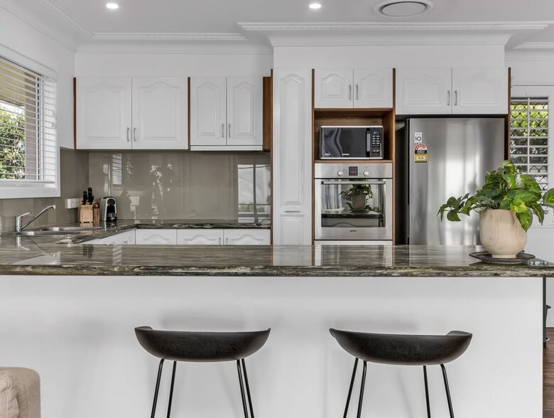 Open kitchen connected to dining space