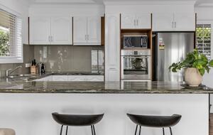 Open kitchen connected to dining space