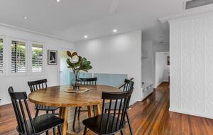 Bright dining area centered around the table