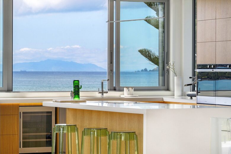 Omaha Waterfront Haven with Pool and Ocean Views - Omaha, New Zealand