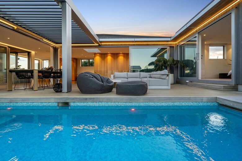 Omaha Waterfront Haven with Pool and Ocean Views - Omaha, New Zealand