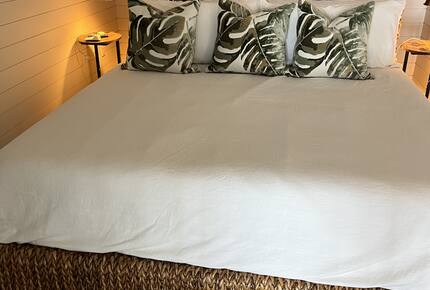 Master bedroom with California king bed