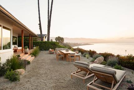 sun loungers, dining in backyard
