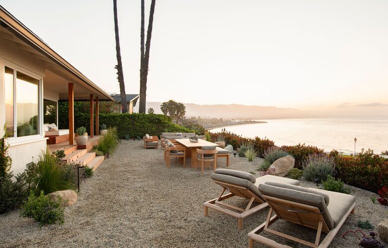 sun loungers, dining in backyard