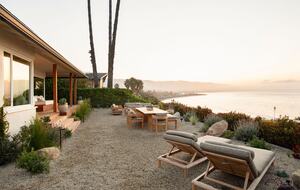sun loungers, dining in backyard