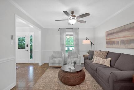 The formal living room has a sleeper sofa