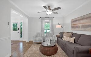 The formal living room has a sleeper sofa