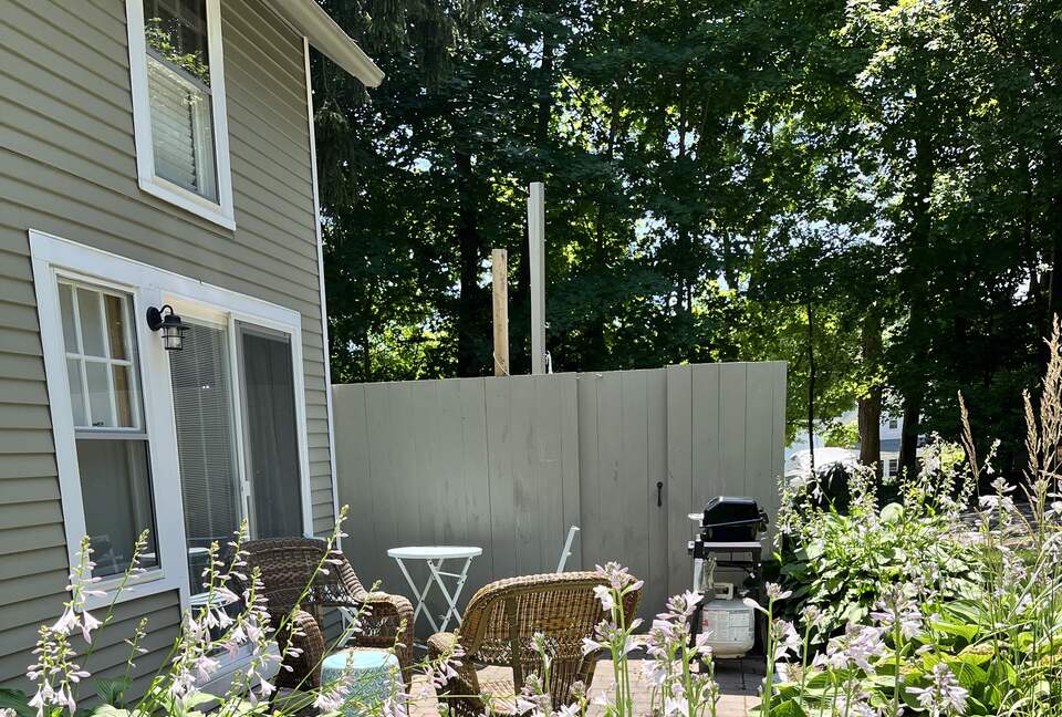 Wonderful back patio with grill and outdoor shower
