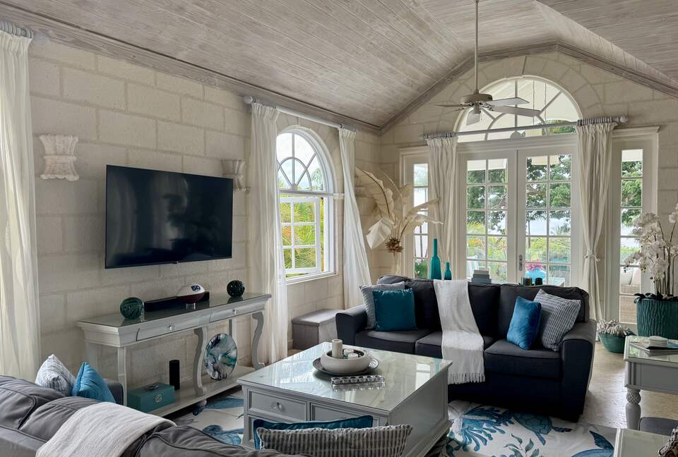 Living room with Caribbean Sea views