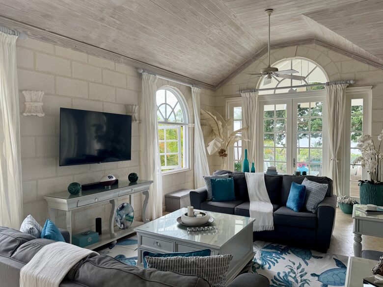Living room with Caribbean Sea views