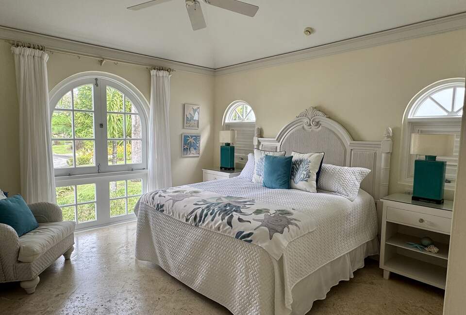 Guest bedroom with garden views
