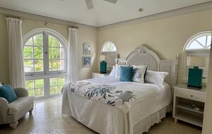 Guest bedroom with garden views