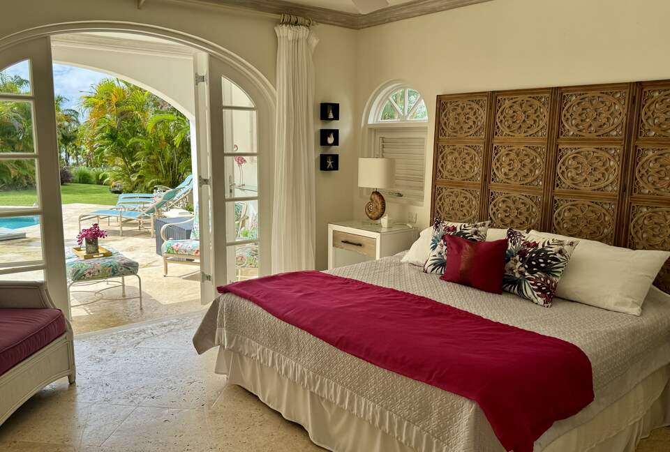 Guest bedroom with outdoor living area and pool access